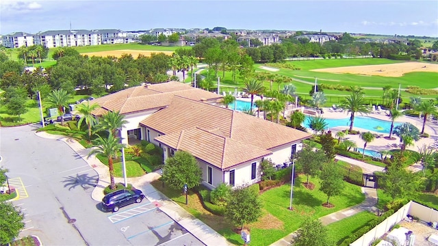 1433 Bunker Dr, Davenport, FL 33896 - bird's eye view of a pool and a golf course