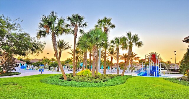 1433 Bunker Dr, Davenport, FL 33896 - view of home's community featuring a lawn