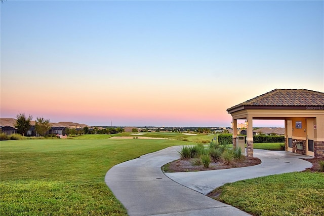 1433 Bunker Dr, Davenport, FL 33896 - surrounding community featuring a yard and concrete driveway