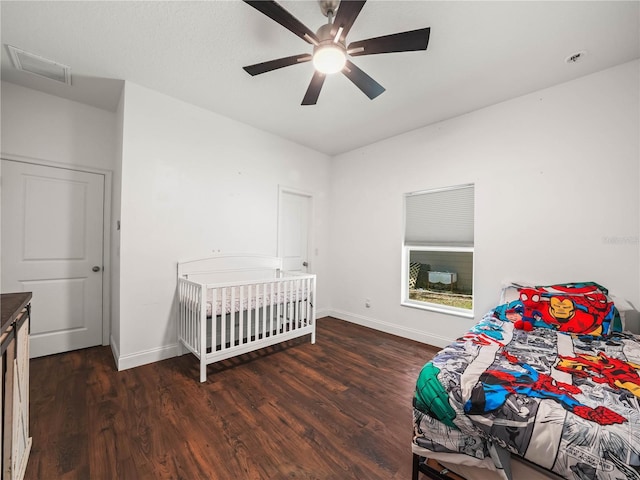 7714 Chase Rd, Lakeland, FL 33810 - bedroom featuring wood finished floors, baseboards, and ceiling fan