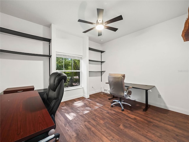 7714 Chase Rd, Lakeland, FL 33810 - home office with a ceiling fan, wood finished floors, and baseboards
