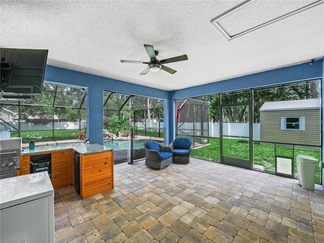 7714 Chase Rd, Lakeland, FL 33810 - unfurnished sunroom with a ceiling fan