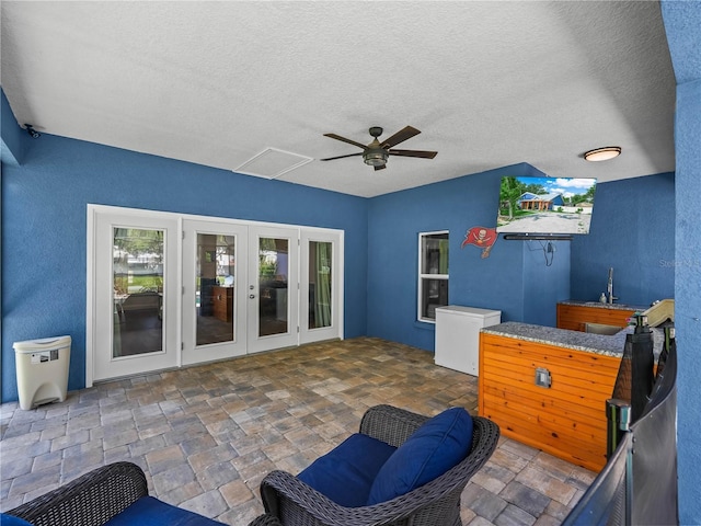 7714 Chase Rd, Lakeland, FL 33810 - view of patio / terrace featuring french doors, ceiling fan, and a sink