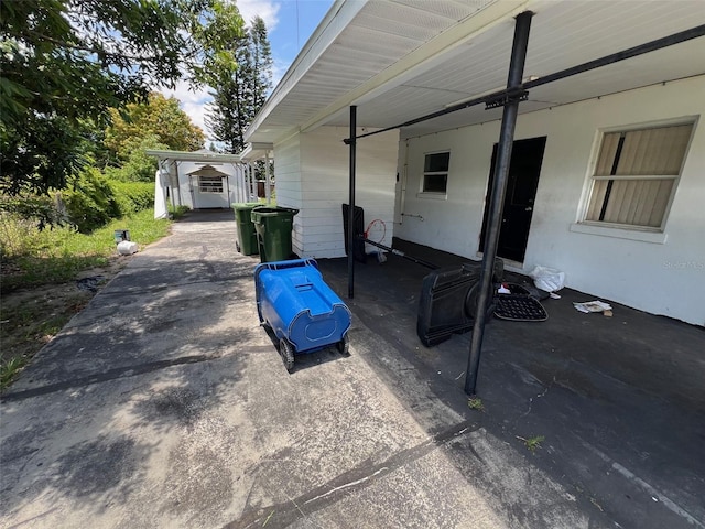 507 Ave H SE, Winter Haven, FL 33880 - view of patio / terrace featuring an outbuilding