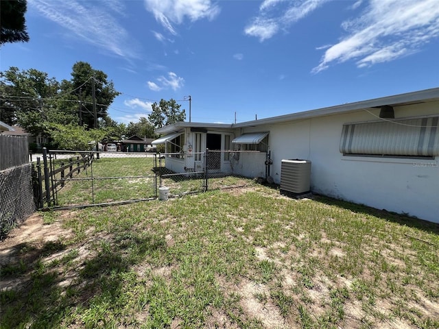 507 Ave H SE, Winter Haven, FL 33880 - view of yard with a gate and cooling unit