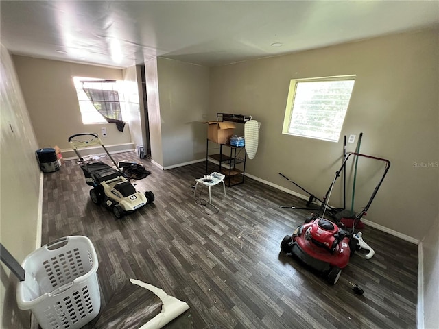 507 Ave H SE, Winter Haven, FL 33880 - recreation room with wood finished floors, healthy amount of natural light, and baseboards