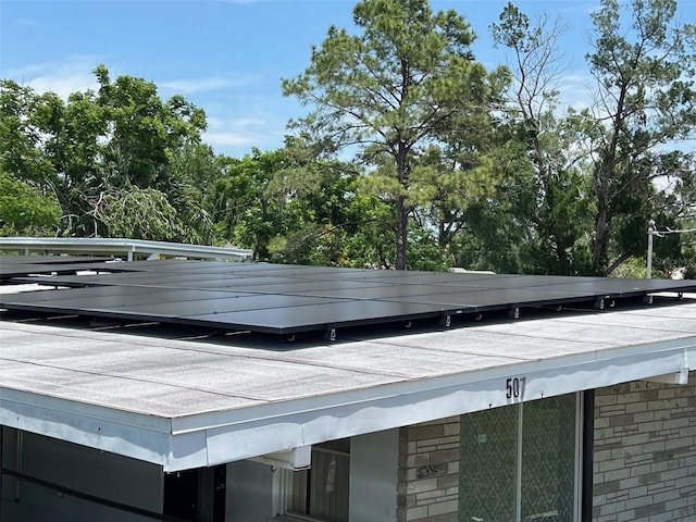 507 Ave H SE, Winter Haven, FL 33880 - exterior view of a rolled roof and brick siding