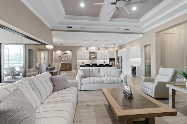 209 Pine Lilly Ct, Lake Alfred, FL 33850 - living room featuring ceiling fan, wine cooler, ornamental molding, and recessed lighting