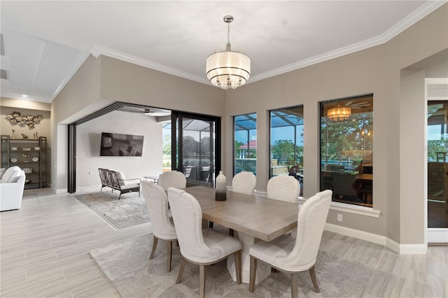 209 Pine Lilly Ct, Lake Alfred, FL 33850 - dining space featuring a chandelier, ornamental molding, light wood-style floors, and baseboards