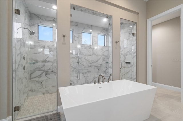 209 Pine Lilly Ct, Lake Alfred, FL 33850 - full bath with a freestanding bath, a marble finish shower, and baseboards