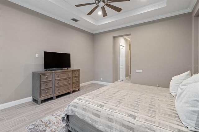 209 Pine Lilly Ct, Lake Alfred, FL 33850 - bedroom with ornamental molding, wood tiled floors, a tray ceiling, baseboards, and recessed lighting