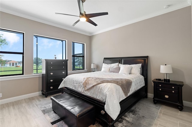 209 Pine Lilly Ct, Lake Alfred, FL 33850 - bedroom featuring ornamental molding, baseboards, light wood-type flooring, and ceiling fan