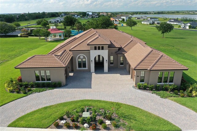 209 Pine Lilly Ct, Lake Alfred, FL 33850 - view of property with curved driveway