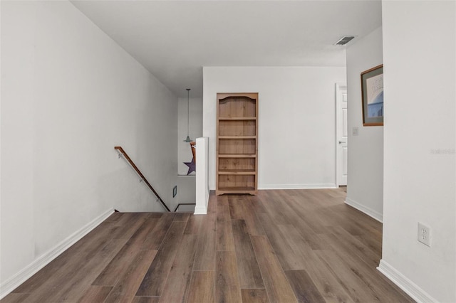 1256 Center St, Dundee, FL 33838 - spare room with wood finished floors and baseboards
