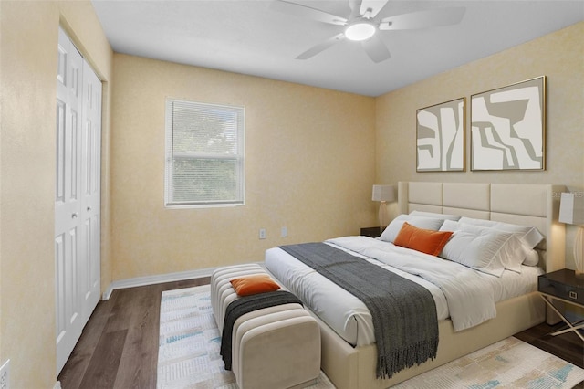 1256 Center St, Dundee, FL 33838 - bedroom featuring wood finished floors, a closet, ceiling fan, and baseboards