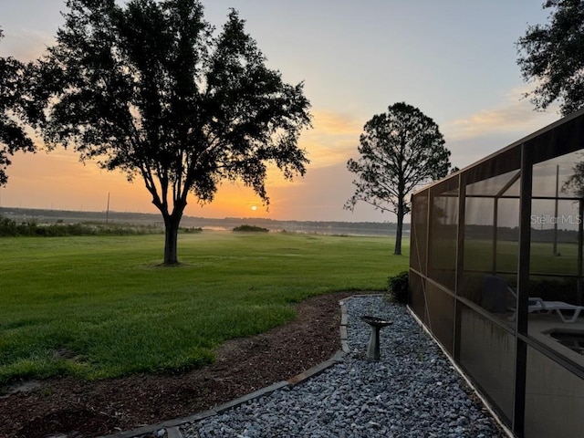 1256 Center St, Dundee, FL 33838 - yard at dusk featuring a yard