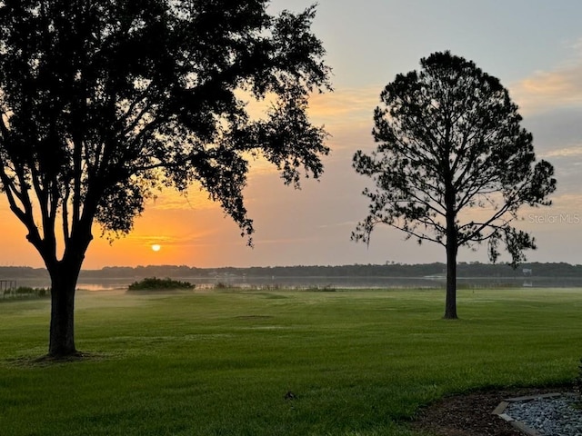 1256 Center St, Dundee, FL 33838 - view of community with a lawn