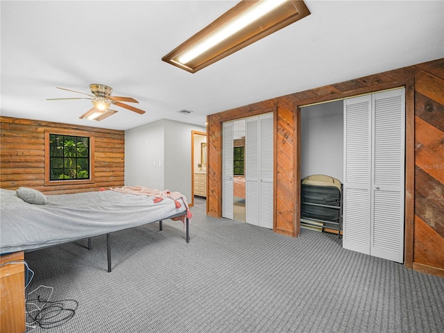 2530 Arbuckle Shores Rd, Frostproof, FL 33843 - carpeted bedroom with multiple closets and ceiling fan