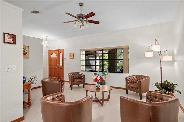 1273 Scrub Jay Trl, Frostproof, FL 33843 - living area with ceiling fan, light tile patterned floors, and a chandelier