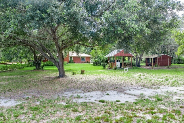 1273 Scrub Jay Trl, Frostproof, FL 33843 - view of grassy yard