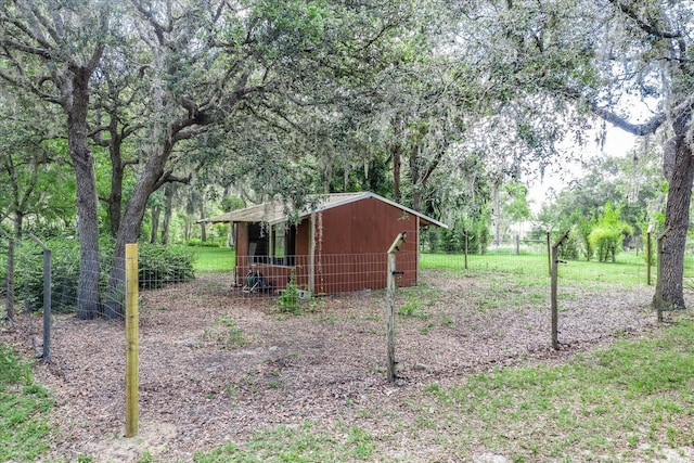 1273 Scrub Jay Trl, Frostproof, FL 33843 - view of yard featuring an outdoor structure and a pole building