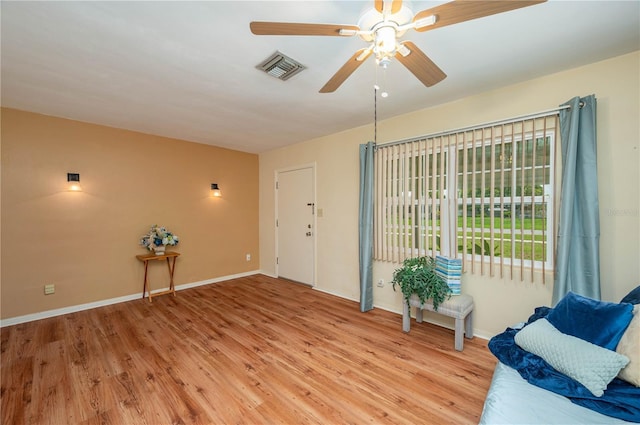 304 W Lake Ave, Auburndale, FL 33823 - entryway featuring a ceiling fan, light wood-style flooring, and baseboards