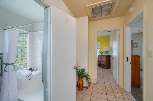 304 W Lake Ave, Auburndale, FL 33823 - corridor with light tile patterned flooring