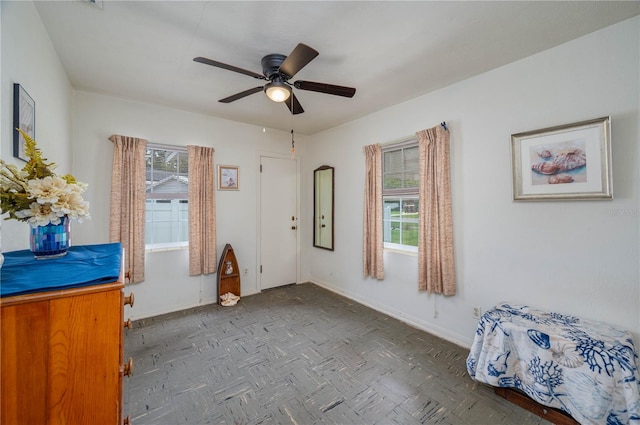304 W Lake Ave, Auburndale, FL 33823 - foyer featuring baseboards and ceiling fan