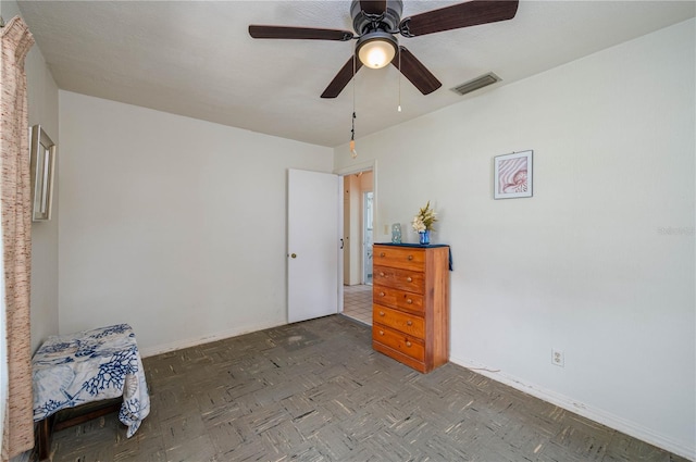 304 W Lake Ave, Auburndale, FL 33823 - bedroom with baseboards and a ceiling fan