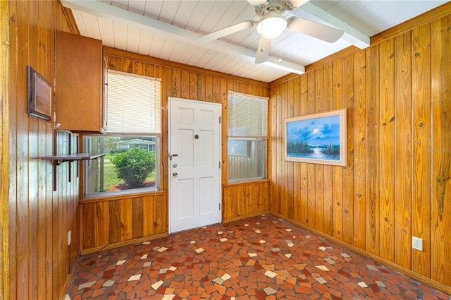 304 W Lake Ave, Auburndale, FL 33823 - empty room with wooden walls, baseboards, ceiling fan, and wooden ceiling with exposed beams