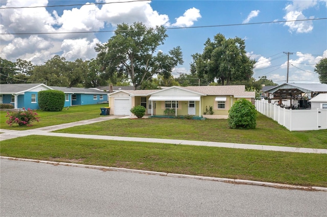 304 W Lake Ave, Auburndale, FL 33823 - ranch-style home featuring driveway, an attached garage, and a porch