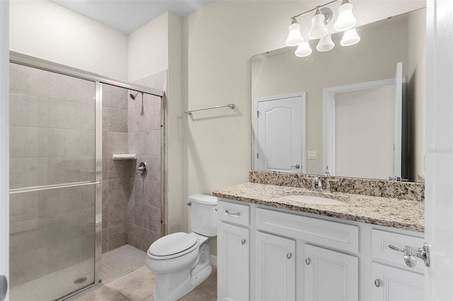 7247 Oakmoss Loop, Davenport, FL 33837 - bathroom featuring toilet, vanity, a shower stall, a chandelier, and tile patterned floors