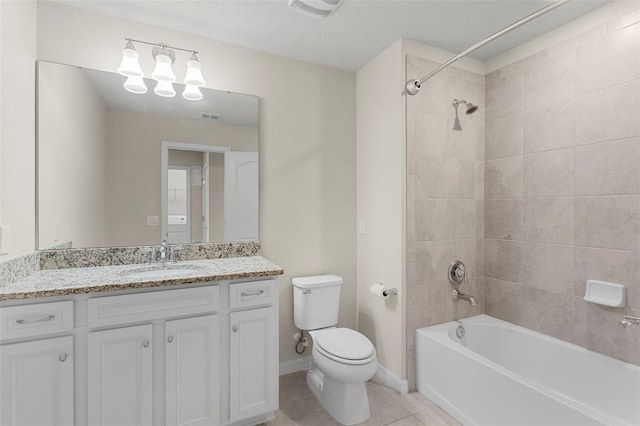 7247 Oakmoss Loop, Davenport, FL 33837 - bathroom with toilet, vanity, shower / washtub combination, tile patterned flooring, and baseboards