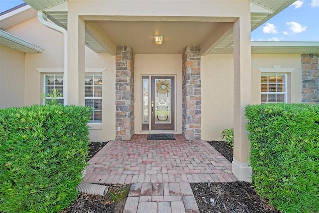 4254 Berwick Dr, Lake Wales, FL 33859 - property entrance with stucco siding and stone siding