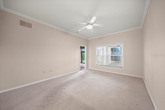 4254 Berwick Dr, Lake Wales, FL 33859 - carpeted empty room featuring crown molding and a ceiling fan