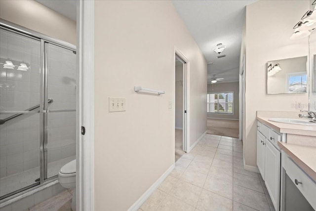 4254 Berwick Dr, Lake Wales, FL 33859 - full bathroom with vanity, a stall shower, tile patterned flooring, and a ceiling fan