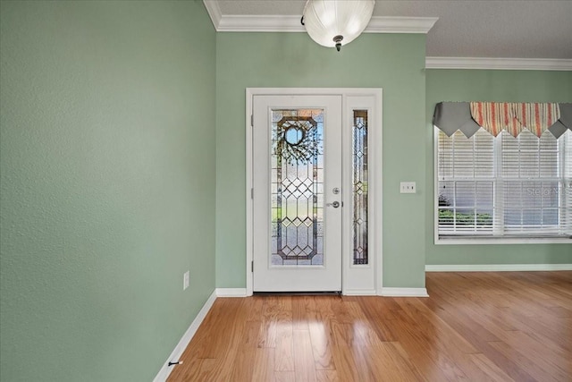 4254 Berwick Dr, Lake Wales, FL 33859 - entrance foyer featuring wood finished floors and ornamental molding