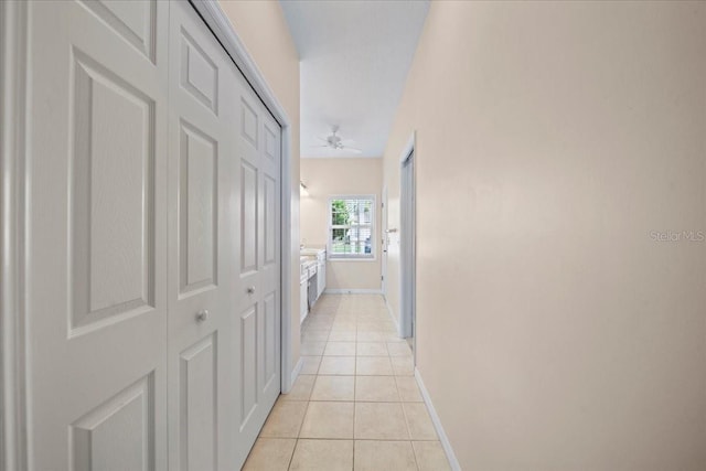 4254 Berwick Dr, Lake Wales, FL 33859 - corridor with light tile patterned floors and baseboards