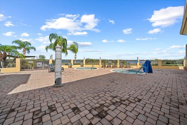4254 Berwick Dr, Lake Wales, FL 33859 - view of property's community featuring a jacuzzi, a patio area, and a swimming pool