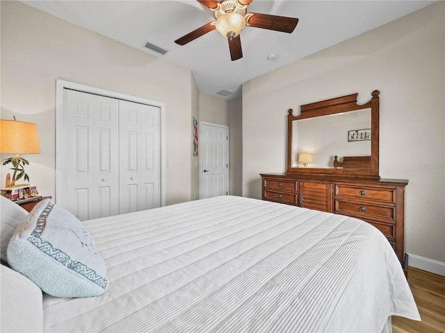 3802 Litchfield Loop, Lake Wales, FL 33859 - bedroom featuring wood finished floors, a closet, and a ceiling fan