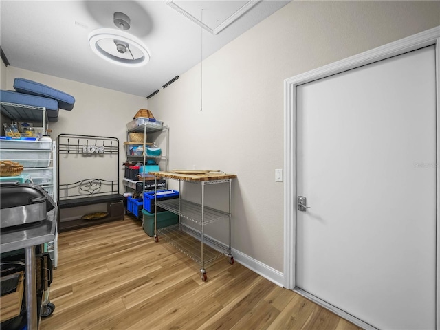 3802 Litchfield Loop, Lake Wales, FL 33859 - storage room featuring attic access
