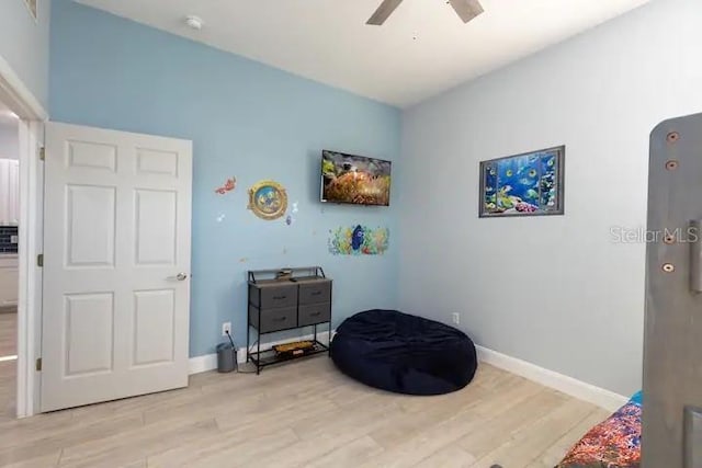 209 Andros Ave Unit 15301, Davenport, FL 33897 - sitting room with light wood finished floors and a ceiling fan