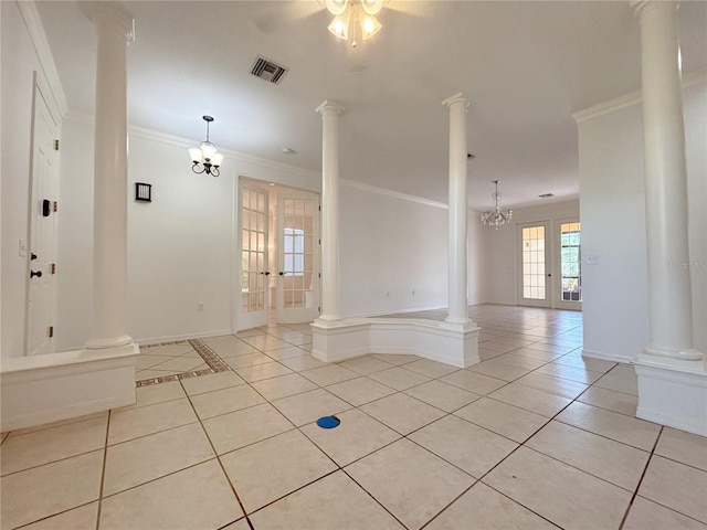 4469 Turnberry Ln, Lake Wales, FL 33859 - unfurnished room featuring ornate columns, light tile patterned floors, ornamental molding, and french doors