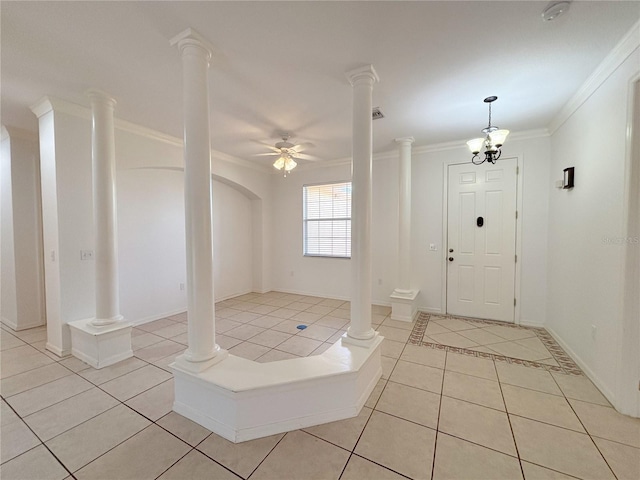 4469 Turnberry Ln, Lake Wales, FL 33859 - entrance foyer with light tile patterned floors, ornamental molding, ceiling fan, and ornate columns