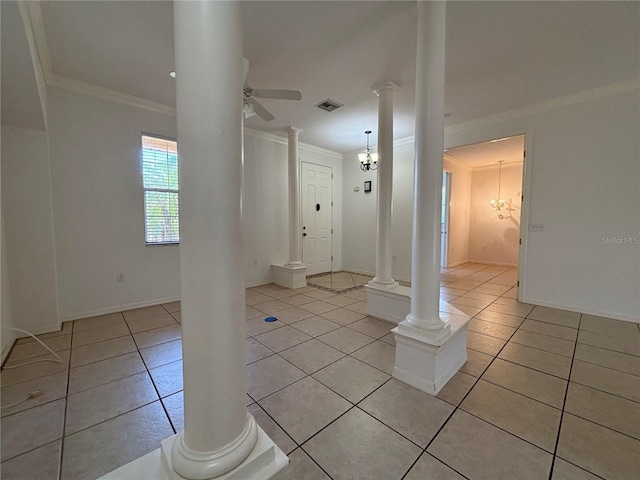 4469 Turnberry Ln, Lake Wales, FL 33859 - empty room with ornate columns, ornamental molding, light tile patterned floors, and a ceiling fan