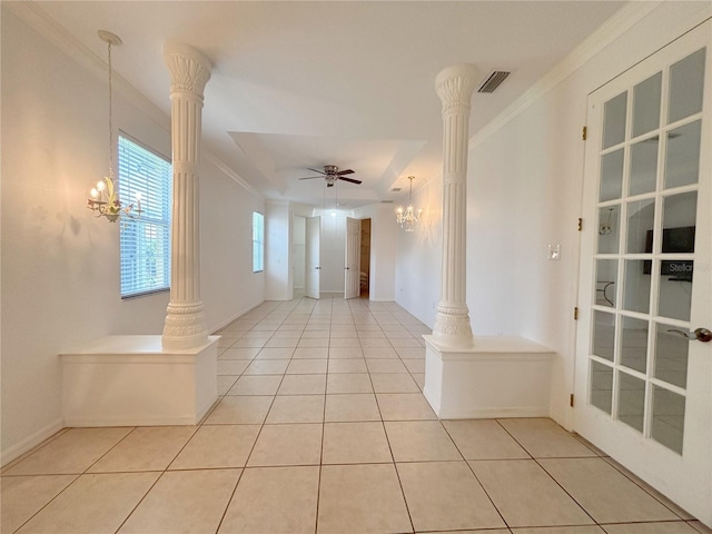 4469 Turnberry Ln, Lake Wales, FL 33859 - unfurnished room with decorative columns, a chandelier, crown molding, light tile patterned flooring, and a ceiling fan