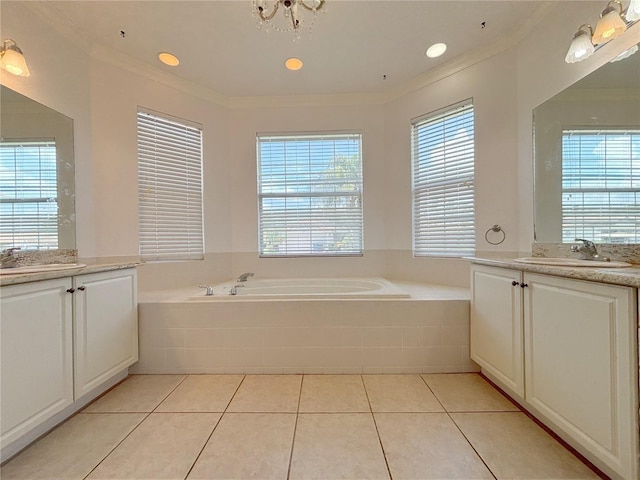 4469 Turnberry Ln, Lake Wales, FL 33859 - full bathroom with ornamental molding, two vanities, a garden tub, and tile patterned flooring