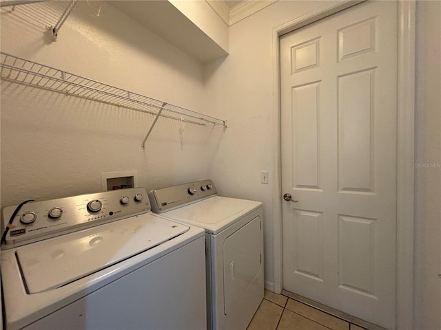 4469 Turnberry Ln, Lake Wales, FL 33859 - washroom with independent washer and dryer and light tile patterned floors