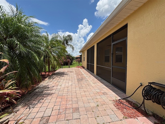 4469 Turnberry Ln, Lake Wales, FL 33859 - view of patio / terrace featuring a sunroom