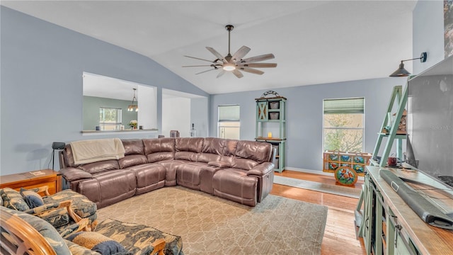 2602 Whitewood Rd, Mulberry, FL 33860 - living area with light wood-type flooring, a ceiling fan, and lofted ceiling
